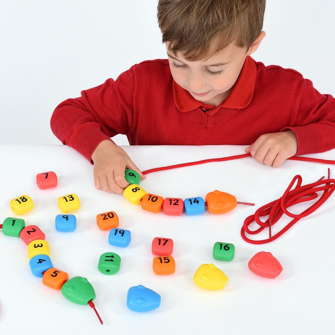 1-20 Lacing Snakes, 1-20 Lacing Snakes,,lacing beads,fine motor skills resources,lacing resources,lacing beads toys, 1-20 Lacing Snakes,The Lace Together Snake comes with five laces, each measuring 80cm long. The colours of the laces are separated by 5s, with green representing 1, 6, 11, and 16, and orange representing 2, 7, 12, and 17, and so on. This makes it easy for children to identify and practice their counting skills. The Lace Together Snake is,1-20The Lace Together Snake comes with five laces, each