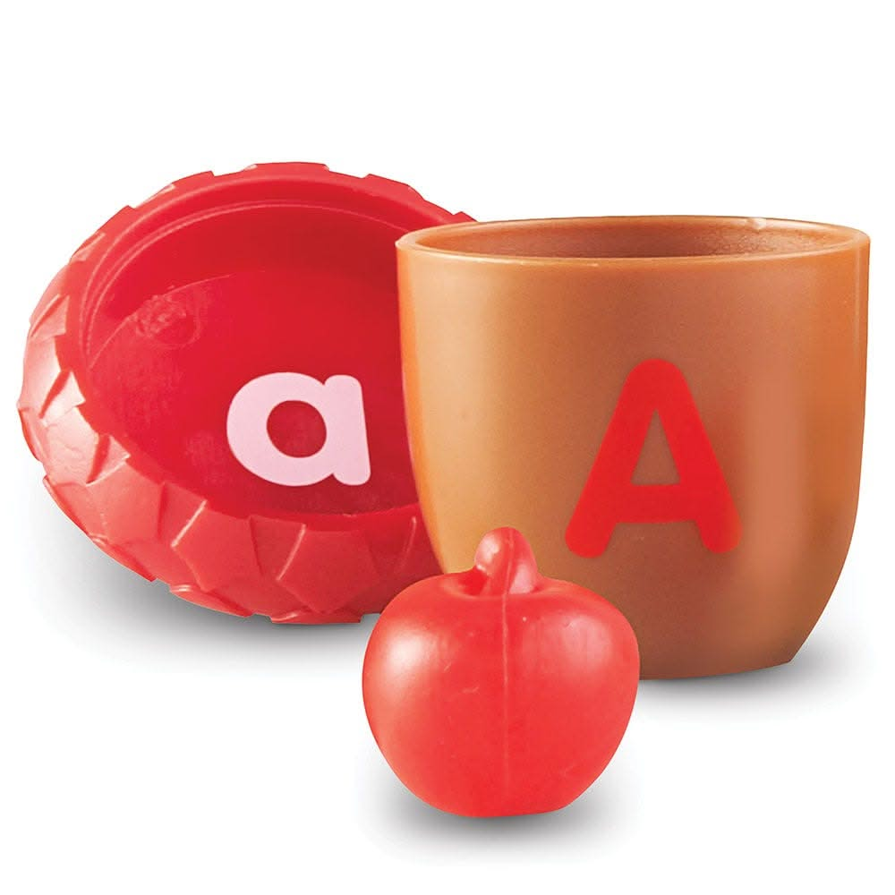 Alphabet Acorns Activity Set, Alphabet Acorns Activity Set, Learning Resources Alphabet Acorns Activity Set, Alphabet Resources, Alphabet Acorns Activity Set,This fun and challenging Alphabet Acorns Activity Set gives children multiple ways to learn and play. Children can match uppercase and lowercase letters as they put the acorns together, plus play hide-and-seek by finding a surprise inside each acorn. The object they find begins with the letter sound on the acorn.This fun and challenging Alphabet Acorns