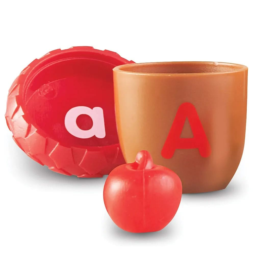 Alphabet Acorns Activity Set, Alphabet Acorns Activity Set, Learning Resources Alphabet Acorns Activity Set, Alphabet Resources, Alphabet Acorns Activity Set,This fun and challenging Alphabet Acorns Activity Set gives children multiple ways to learn and play. Children can match uppercase and lowercase letters as they put the acorns together, plus play hide-and-seek by finding a surprise inside each acorn. The object they find begins with the letter sound on the acorn.This fun and challenging Alphabet Acorns