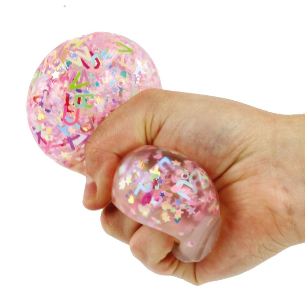 Alphabet Glitter Ball 60mm, Alphabet Glitter Ball 60mm,Squeezy glitter ball,glitter stress ball,squishy glitter ball, Alphabet Glitter Ball 60mm,Give your child a sensory experience like no other with the Alphabet Glitter Balls. These irresistible, gel-filled balls serve multiple purposes—from stress reduction and hand strengthening to providing a delightful fidgeting experience. Filled with shiny, miniature alphabet letters suspended in a durable, clearGive your child a sensory experience like no other wit