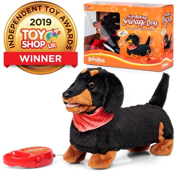 Animigos Scampering Sausage Dog, Animigos Scampering Sausage Dog,Flipping Dog,Animigos Scampering Sausage Dog,Hopping Dog toy, Animigos Scampering Sausage Dog,The Animigos Scampering Sausage Dog is a plush sausage dog that has a range of animated features. Push the button on his long lead and the Animigos Scampering Sausage Dog walk forward or pause to bark. It has a lovely, black and brown coat and a fetching red bandanna. Part of the Animigos range. Animigos ScamperingThe Animigos Scampering Sausage Dog i