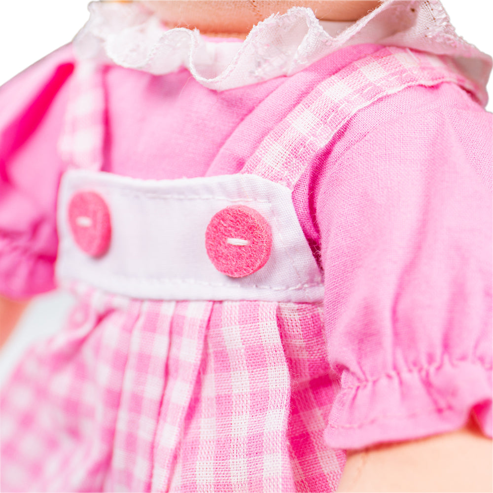 Ava Doll - Medium, Ava Doll - Medium,Bigjigs Ava Doll,Bigigs Dolls,Children's Dolls, Ava Doll - Medium,Introducing Ava, the ragdoll designed to steal hearts and spark imaginations. Ava isn't just a toy; she's a companion, a comfort, and a catalyst for endless imaginative play. Dressed in a beautiful pink checked pinny outfit adorned with a charming butterfly and flower print at the bottom, Ava's sweet smile is irresisti,Ava Doll -Introducing Ava, the ragdoll designed to steal hearts and spark imaginations. 