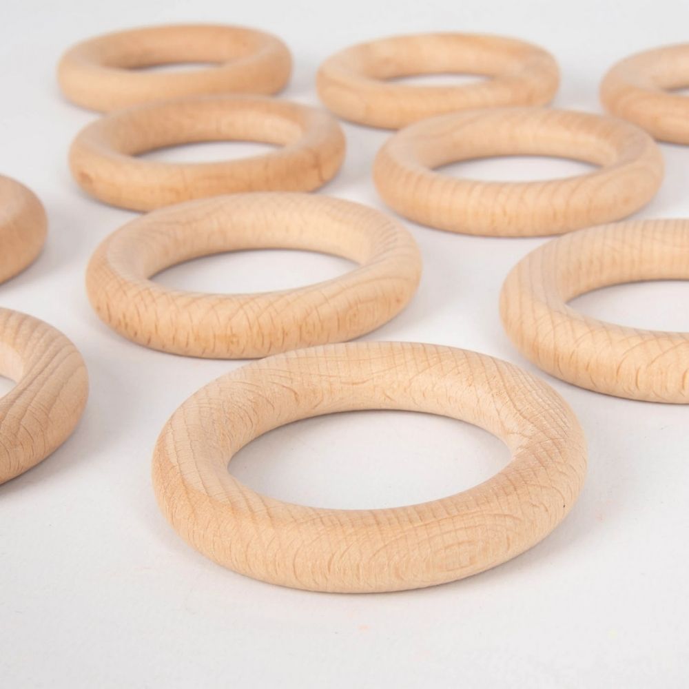 Beechwood Rings Pack of 10, Beechwood Rings Pack of 10,Heuristic Play,Heuristic Play babies,baby Heuristic Play,toddler Heuristic Play,Heuristic Play resources,Heuristic Play ideas, Beechwood Rings Pack of 10,Beechwood Rings Pack of 10 – Ignite Imagination Through Heuristic Play Open the door to a world of discovery with the Beechwood Rings Pack of 10. Designed to inspire toddlers' natural curiosity, these 56mm wooden rings are perfect for heuristic play, offering endless possibilities for exploration, crea