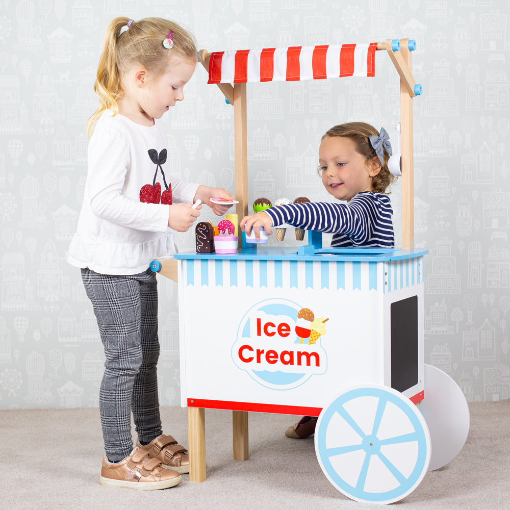 Bigjigs Ice Cream Cart, Bigjigs Ice Cream Cart,Bigjigs toys,Bigjigs discount,pretend play wooden kitchen,toddler kitchen,childrens kitchen toy, Bigjigs Ice Cream Cart,Serve up some yummy ice cream to friends and family - theres plenty to go around! This quality wooden Ice Cream Cart comes complete with 6 ice creams, 9 ice lollies, 2 ice cream pots with spoons and an ice cream scoop. Spark hours of imaginative and educational pretend play with these wooden sweet treats as little onesBigjigsServe up some yumm