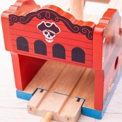 Bigjigs Pirate Galleon, Bigjigs Pirate Galleon,Bigjigs rail,Bigjigs rail toys,bigjigs railway toys,bigjigs wooden railway track set,Pretend play toys, Bigjigs Pirate Galleon,This wooden Pirate Galleon makes an exciting addition to a track layout. Your little one can watch the train steam through the lower deck through the portholes and viewing hole and then close up the elasticated track pieces on either end when it comes time to set sail in the octopus infested waters! EncouragesThis wooden Pirate Galleon 