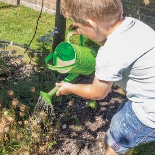 Bigjigs Toys Green Watering Can, Green Watering Can,Bigjigs watering can,Childrens watering can,messy play toys,water play toys,watering can for children,watering can kids, Bigjigs Toys Green Watering Can,Bigjigs Toys Green Watering Can – A Perfect Companion for Little Gardeners The Bigjigs Toys Green Watering Can is the ideal tool for young gardening enthusiasts eager to lend a hand in the garden. Perfectly designed for little hands, this watering can features both a top and side handle, ensuring children 