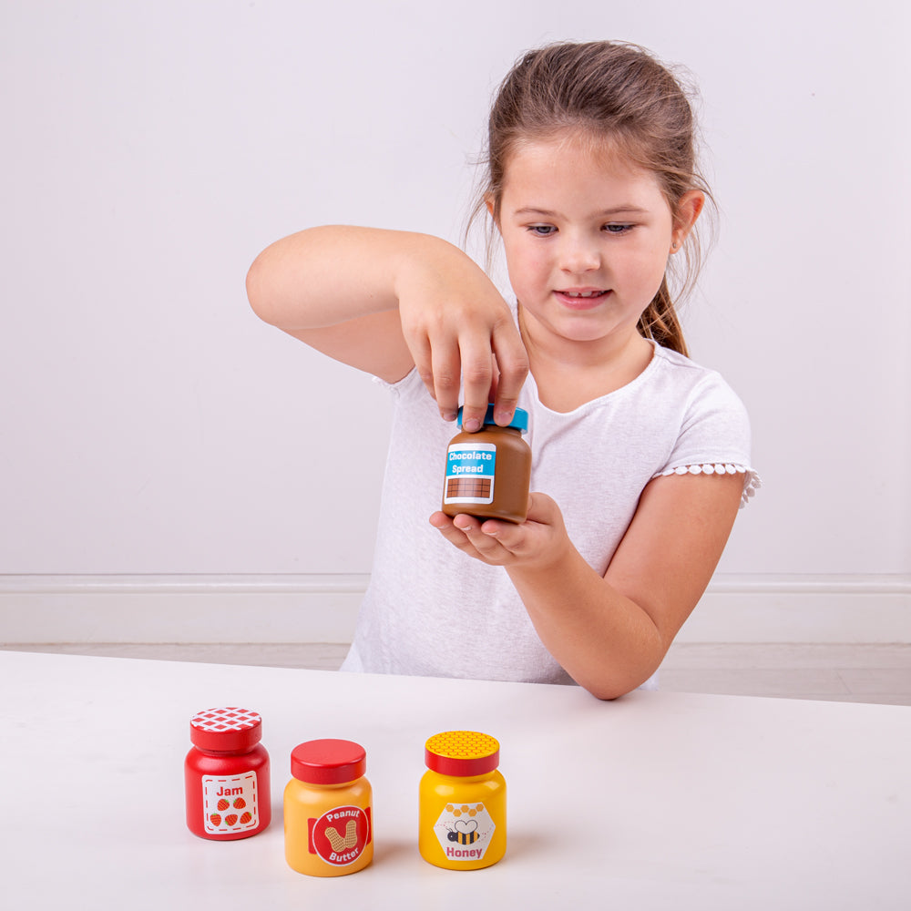 Bigjigs Toys Jars and Spreads, Bigjigs Toys Jars and Spreads,Bigjigs wooden toys,wooden toys,bigjigs wooden toys, pretend play toys,pretend play resources, Bigjigs Toys Jars and Spreads,Spark hours of imaginative play with these yummy Jars & Spreads! This realistic wooden play food includes Chocolate Spread, Honey, Peanut Butter and Jam. Perfectly paired with the Bigjigs Toys Toaster whip up family and friends some yummy toast for breakfast, or even as an afternoon snack! Our Jars & Spreads are aSpark hours