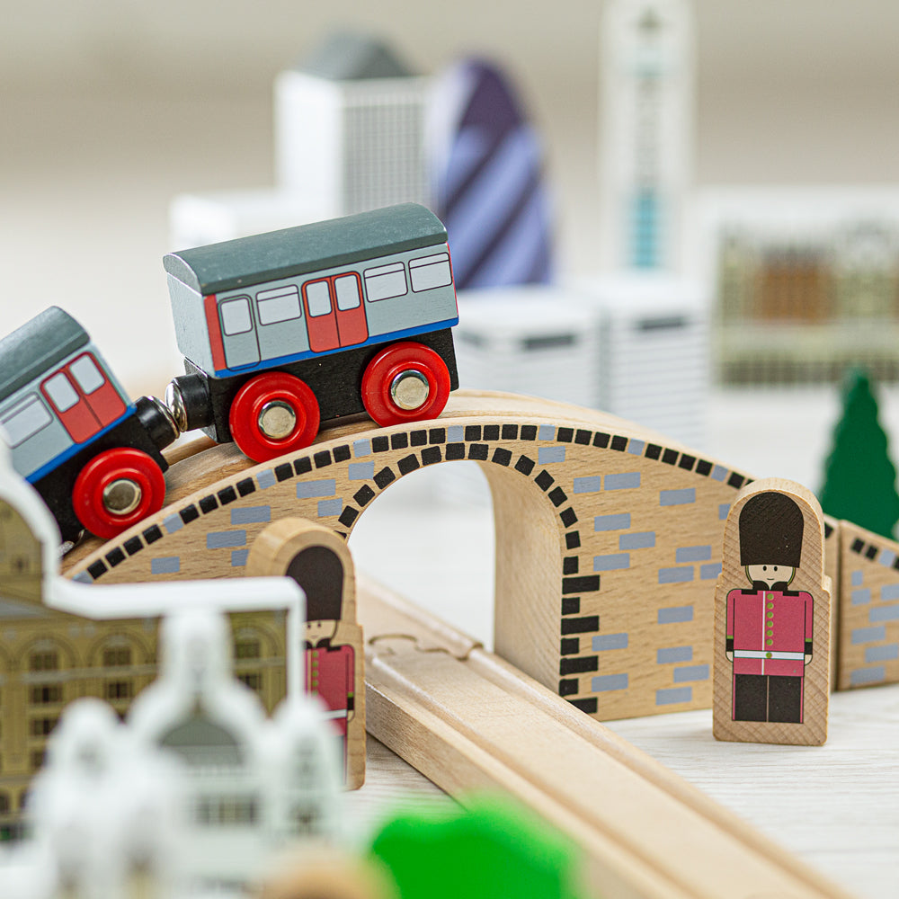 City of London Train Set, City of London Train Set,Bigjigs Wooden Train Set,Wooden train set,childrens wooden train set,toddlers train set,Bigjigs approved retailer, City of London Train Set,Next train approaching! Which underground station are you heading to? The Tidlo City of London Train Set will delight young railway enthusiasts as they chug the Underground Train around the figure of eight track layout, up and over the hill, dropping keen tourists off at iconic London attractions! The track is not limi,