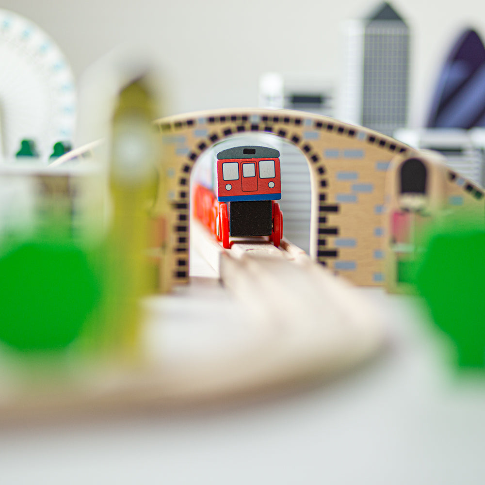 City of London Train Set, City of London Train Set,Bigjigs Wooden Train Set,Wooden train set,childrens wooden train set,toddlers train set,Bigjigs approved retailer, City of London Train Set,Next train approaching! Which underground station are you heading to? The Tidlo City of London Train Set will delight young railway enthusiasts as they chug the Underground Train around the figure of eight track layout, up and over the hill, dropping keen tourists off at iconic London attractions! The track is not limi,