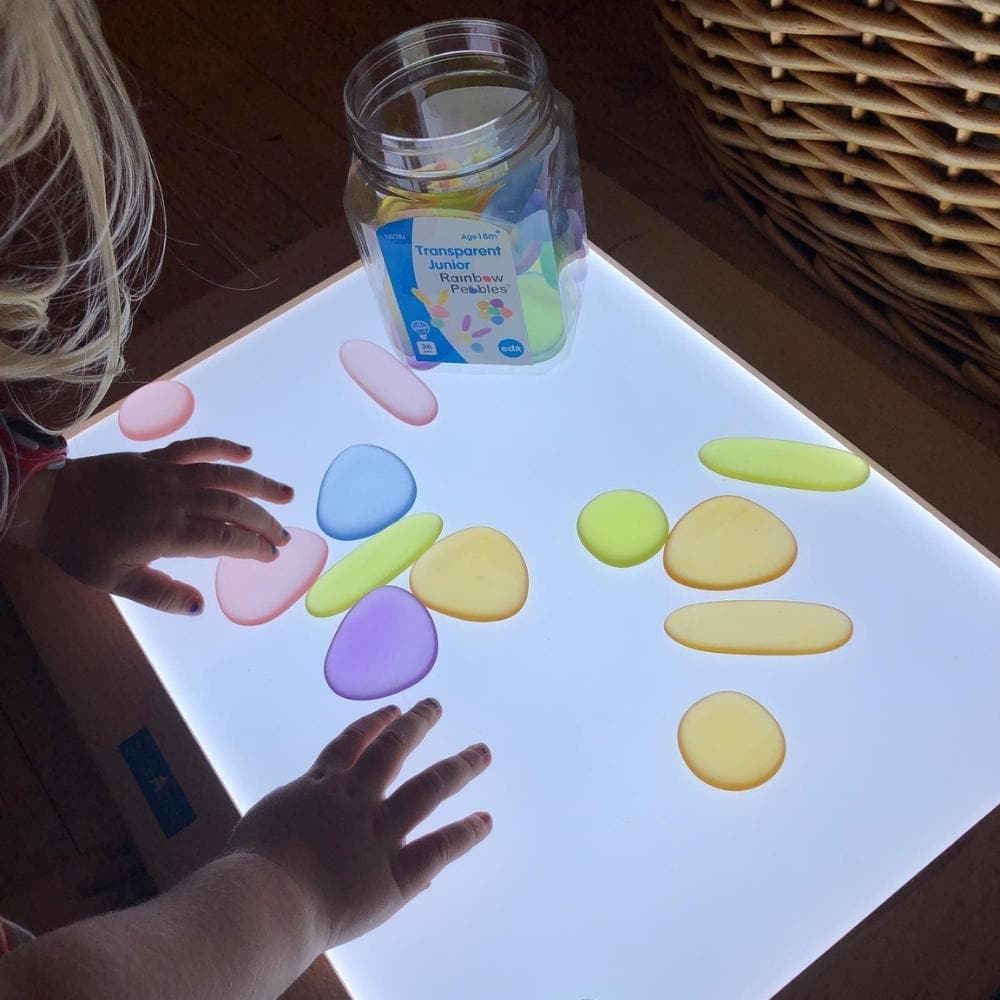 Clear Junior Rainbow Pebbles, Clear Junior Rainbow Pebbles, sensory pebbles,counting pebbles,yellowdoor,yellow door discount code, Clear Junior Rainbow Pebbles,The Clear Junior Rainbow Pebbles are an appealing early construction and manipulative set. The Clear Junior Rainbow Pebble set is ideal for developing fine motor skills and are fascinating viewed on a light panel. The smooth Clear Junior Rainbow Pebbles come in 3 shapes and 6 soft translucent colours, supplied in a con,Clear Junior RainbowThe Clear J