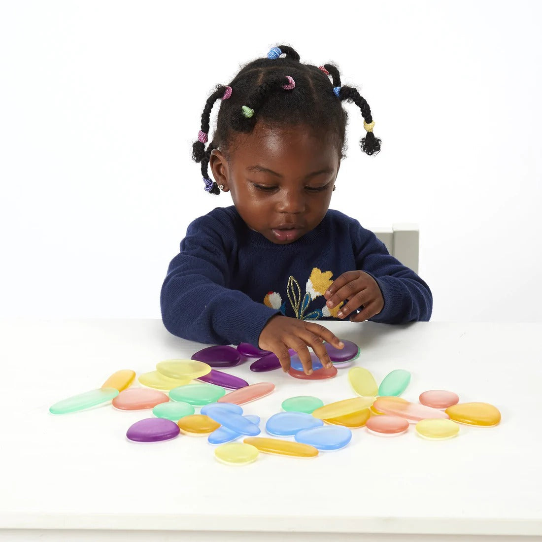 Clear Junior Rainbow Pebbles, Clear Junior Rainbow Pebbles, sensory pebbles,counting pebbles,yellowdoor,yellow door discount code, Clear Junior Rainbow Pebbles,The Clear Junior Rainbow Pebbles are an appealing early construction and manipulative set. The Clear Junior Rainbow Pebble set is ideal for developing fine motor skills and are fascinating viewed on a light panel. The smooth Clear Junior Rainbow Pebbles come in 3 shapes and 6 soft translucent colours, supplied in a con,Clear Junior RainbowThe Clear J