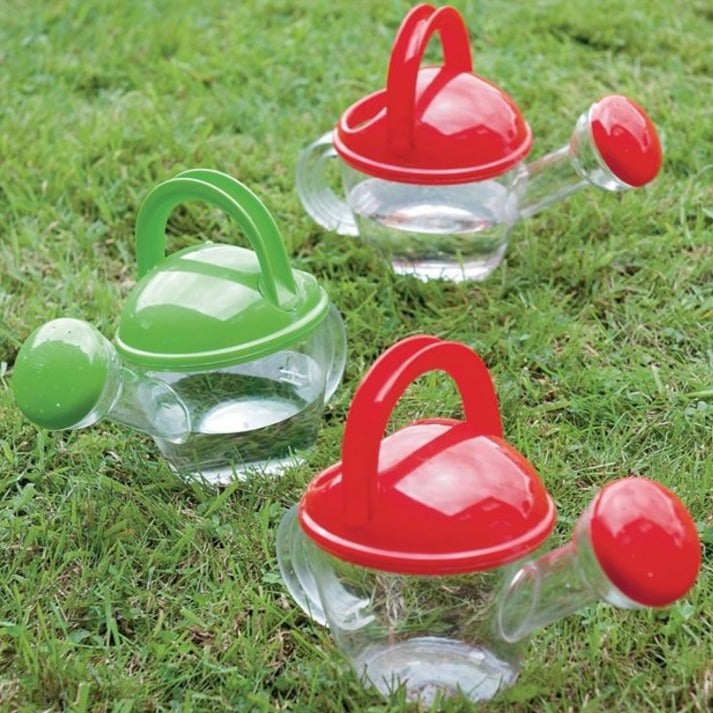 Clear Watering Can, Clear Watering Can,Childrens watering can,Bigjigs Clear Watering Can,messy play toys,water play toys,watering can for children,watering can kids,animal watering can, Clear Watering Can,Introducing the Clear Watering Can - the perfect addition to any junior outdoor range or beach and water toy collection! This transparent watering can is designed with functionality and fun in mind.With its generous capacity, the Clear Watering Can can be easily filled to the brim with water, allowing for 