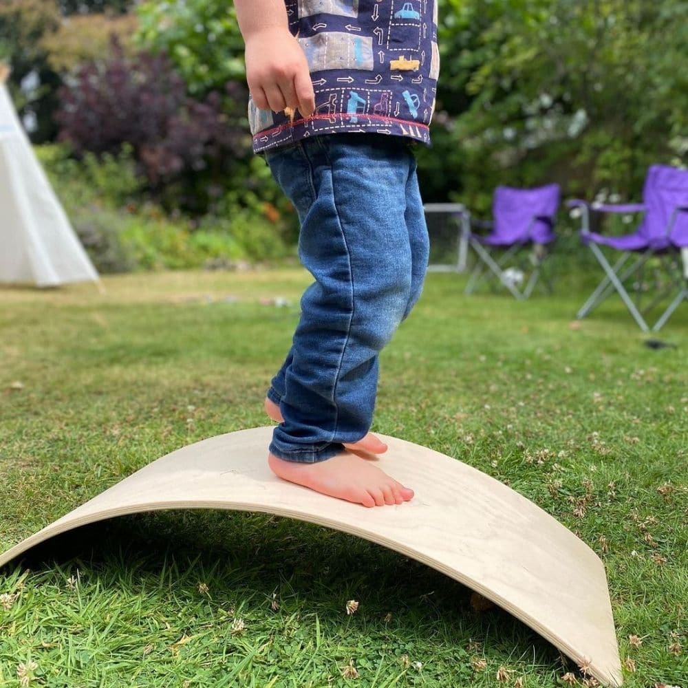 Curvy Balance Board, Curvy Balance Board,Wooden Balance Board,balance board,balancing board,sensory balance board,sensory rocking board, Curvy Balance Board,These Wooden Curvy Balance Boards do exactly what they say on the tin – the simplicity of the idea is what we love. Children can balance on the boards in many different positions – standing, lying or kneeling and when they are done with that, they can use it as a bridge to crawl under or pull their friend across the ca,Curvy Balance BoardThese Wooden Cu