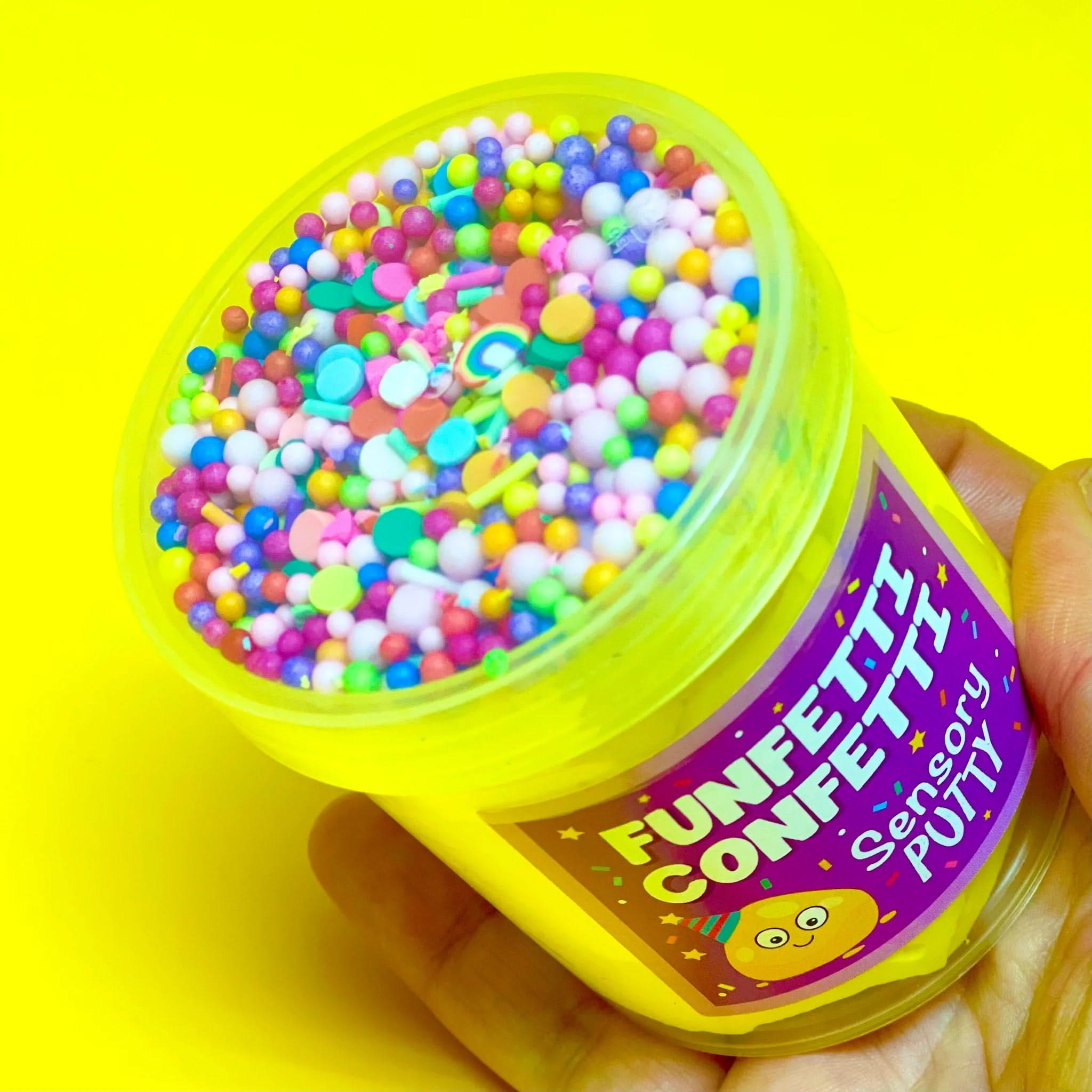 Funfetti Confetti Putty, Funfetti Confetti Putty,Sensory Putty,slimepartyuk, Slime party,sensory putty, Funfetti Confetti Putty,It's time to celebrate with our funfetti confetti putty! Filled to the brim with rainbow sprinkles, floam balls and stars, that mix perfectly with our gentle sweet scent, yellow putty to create a sensory party in a pot! Putties are air reactive and will dry out of left out. Always return to the container after playIt's time to celebrate with our funfetti confetti putty! Filled to t