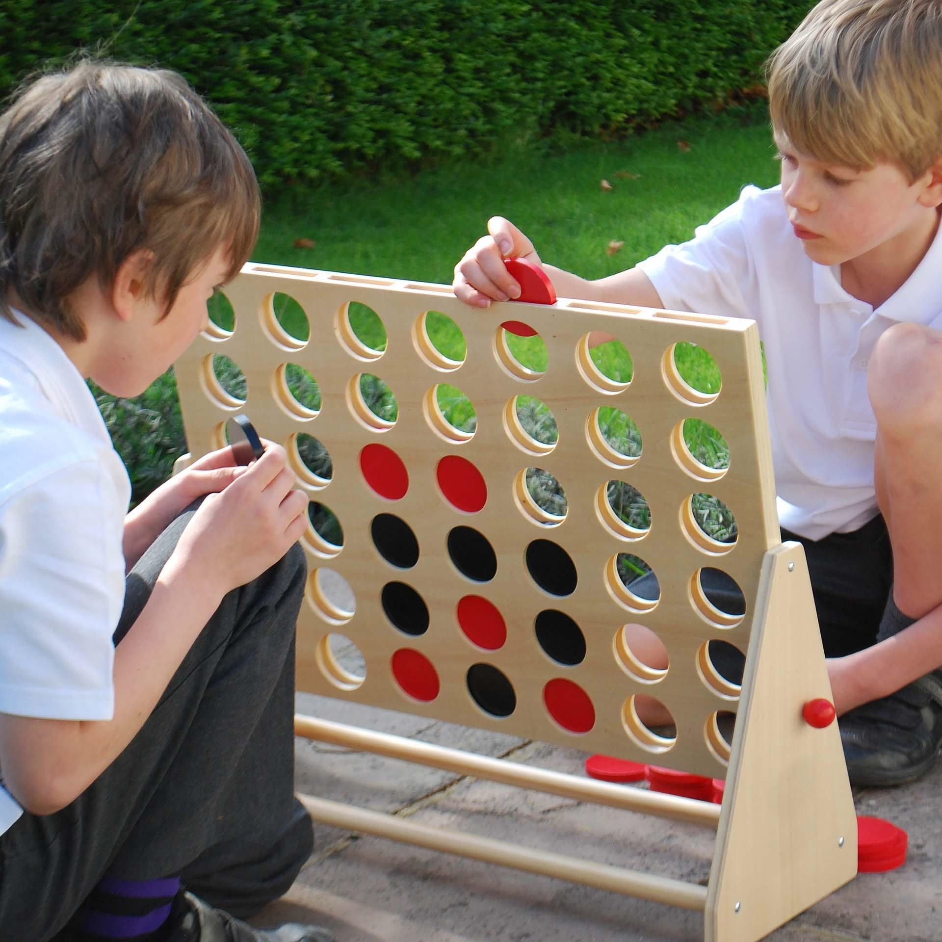 Giant Wooden 4 In A Row, Giant 4 in a Row Game,outdoor games,outdoor games for schools,outdoor classroom games,large connect 4,wooden connect 4,connect 4 game for the garden, Giant Wooden 4 In A Row,A large version of the traditional wooden 4 in a row game with a sturdy frame and smooth finished wooden black and red counters. The Wooden 4 In A Row is made of rugged plywood construction is of excellent quality and is ideal for outdoor play. Use in the conventional way – racing your partner to make a row of f