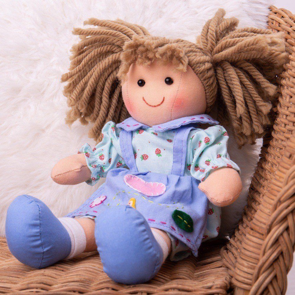 Grace Doll - Small, , Grace Doll - Small,Introducing Grace, a soft and cuddly rag doll that aims to be your child's new favorite companion. With her sweet blue dress adorned with a delightful strawberry pattern and her hair styled in cute bunches, she's all set to win your little one's heart. Key Features: Soft and Cuddly: Grace is made from soft materials th,Grace Doll - SmallIntroducing Grace, a soft and cuddly rag doll that aims to be your child's new favorite companion. With her sweet blue dress adorned