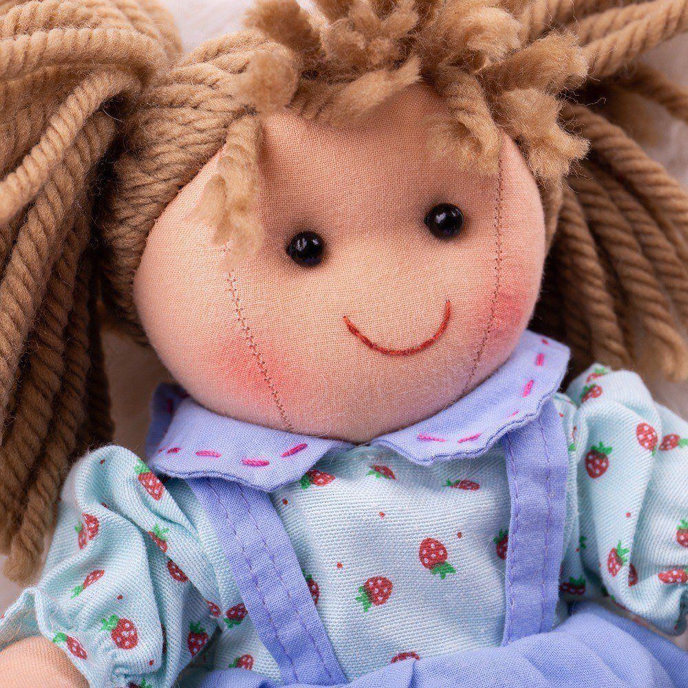 Grace Doll - Small, , Grace Doll - Small,Introducing Grace, a soft and cuddly rag doll that aims to be your child's new favorite companion. With her sweet blue dress adorned with a delightful strawberry pattern and her hair styled in cute bunches, she's all set to win your little one's heart. Key Features: Soft and Cuddly: Grace is made from soft materials th,Grace Doll - SmallIntroducing Grace, a soft and cuddly rag doll that aims to be your child's new favorite companion. With her sweet blue dress adorned