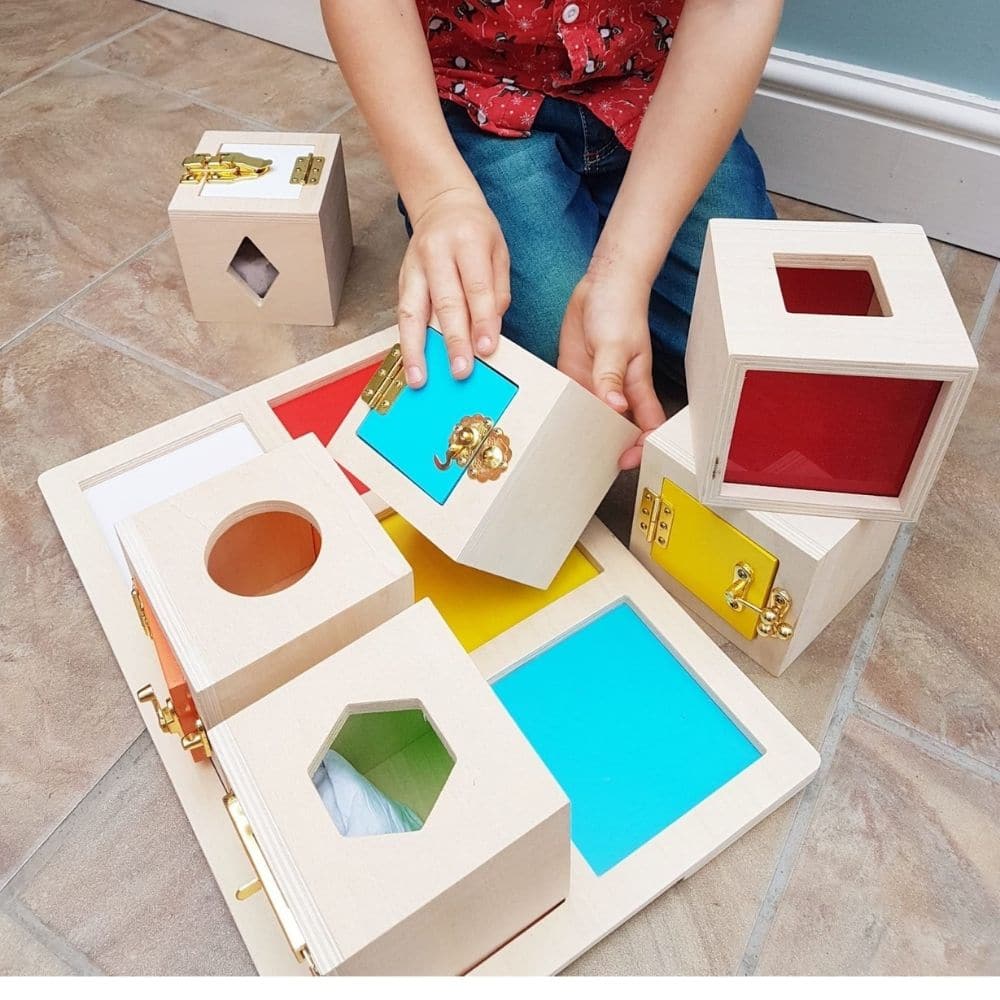 Guidecraft Peekaboo Lock Boxes, Guidecraft Peekaboo Lock Boxes,Lock Box,Sensory lock box,special needs locks box,Bigjigs lock box, Guidecraft Peekaboo Lock Boxes,Unlock each box to explore what's behind each door! This Guidecraft Peekaboo Lock Boxes set of six wooden lock boxes is ideal for learning shape, colour, and spatial relationships. Sort the shapes into the appropriate lock boxes, view them through the transparent, coloured acrylic windows, and unlock the doors to retri,Guidecraft PeekabooUnlock eac