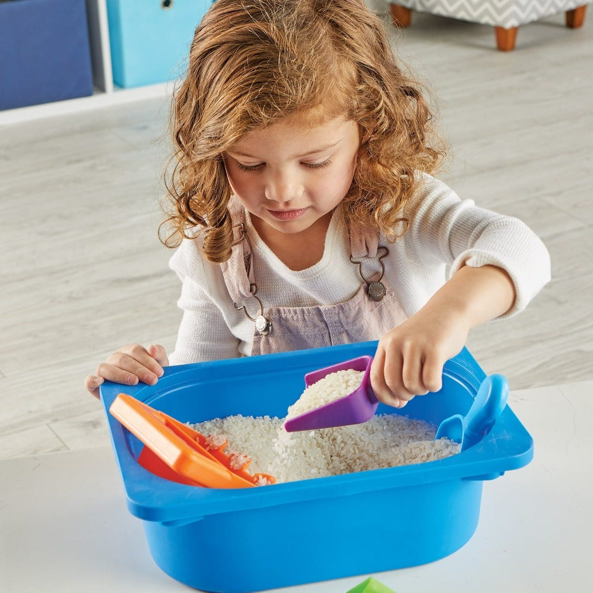 Helping Hands Sensory Scoops, Helping Hands Sensory Scoops,Learning Resources,,Fine motor skills resources,early years resources, educational resources, Helping Hands Sensory Scoops,Little ones pour, sift, funnel, and scoop their way to fine motor skills with this set of colourful Helping Hands Sensory Scoops. Sized just right for little hands, the 4 fun fine motor tools in this set each come with a unique way to scoop: children can rotate and sift; funnel and stamp; twist and pour; or practise a ,Helping H