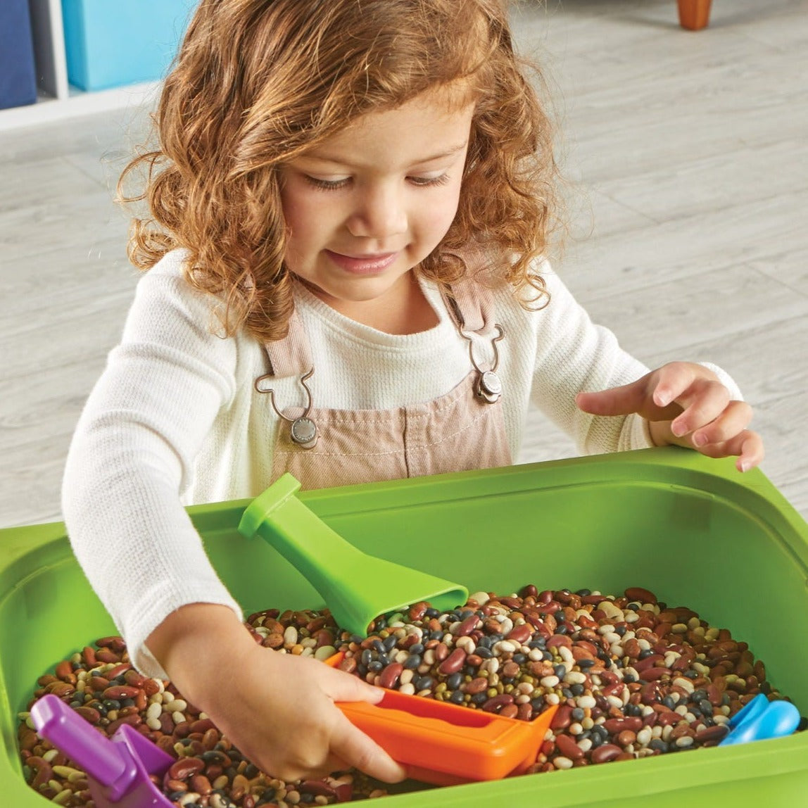 Helping Hands Sensory Scoops, Helping Hands Sensory Scoops,Learning Resources,,Fine motor skills resources,early years resources, educational resources, Helping Hands Sensory Scoops,Little ones pour, sift, funnel, and scoop their way to fine motor skills with this set of colourful Helping Hands Sensory Scoops. Sized just right for little hands, the 4 fun fine motor tools in this set each come with a unique way to scoop: children can rotate and sift; funnel and stamp; twist and pour; or practise a ,Helping H