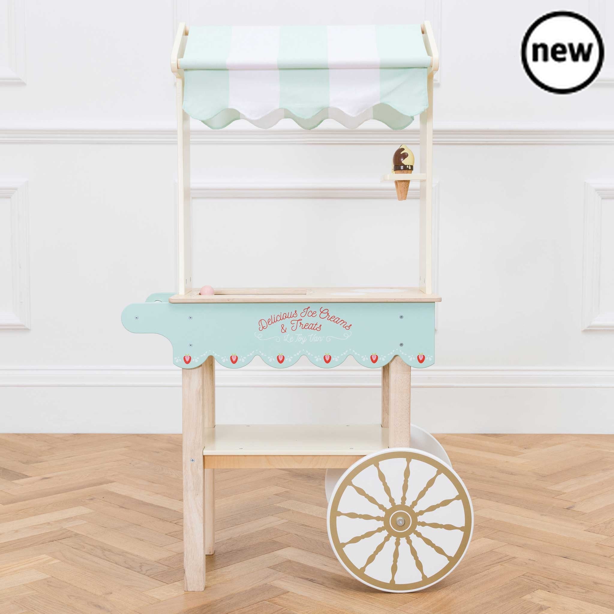 Ice Cream Trolley and Treats, Ice Cream Trolley and Treats,Pretend Play Toys,Role Play Toys,Christmas Toys, Ice Cream Trolley and Treats,This whimsical Ice-Cream Trolley toy is a nostalgic nod to bygone days and fairs, encouraging both imaginative play and a sense of wonder in children. Key Features Design: The trolley features a barrow style with a classic striped fabric canopy that adds to its vintage allure. Material: Crafted from sustainable wood, t,Ice Cream Trolley andThis whimsical Ice-Cream Trolley 