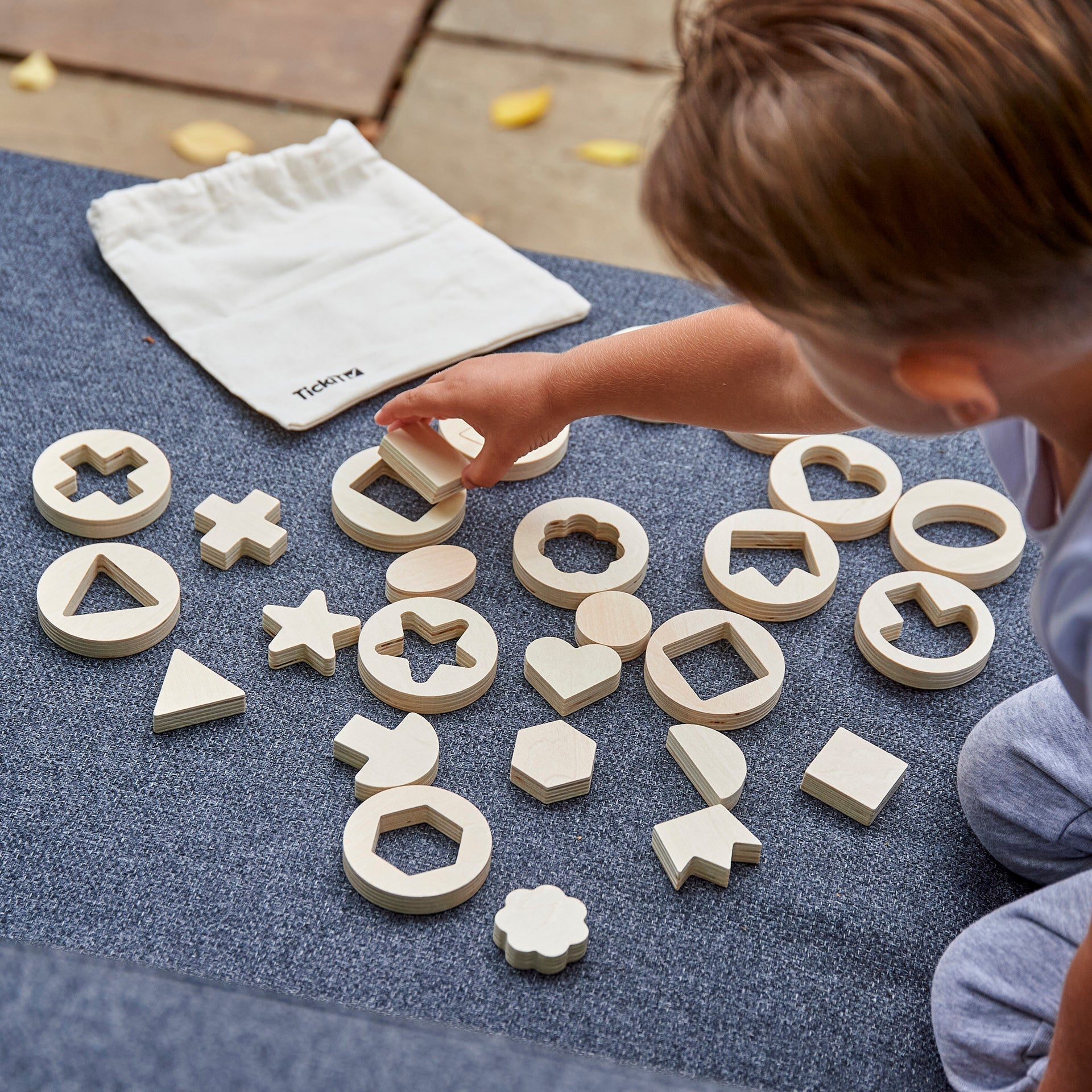 Inside Outside Wooden Shapes, Inside Outside Wooden Shapes,TickIT Inside Outside Wooden Shapes,Shape sorting toys,Puzzle solving toys, Inside Outside Wooden Shapes,The TickiT® Inside Outside Wooden Shapes set offers endless opportunities for your child to develop essential skills through hands-on exploration of shapes and patterns. This thoughtfully designed set includes 14 beautifully crafted wooden discs, each containing a unique shape that can be removed and used for tracing, ,Inside Outside WoodenThe Ti