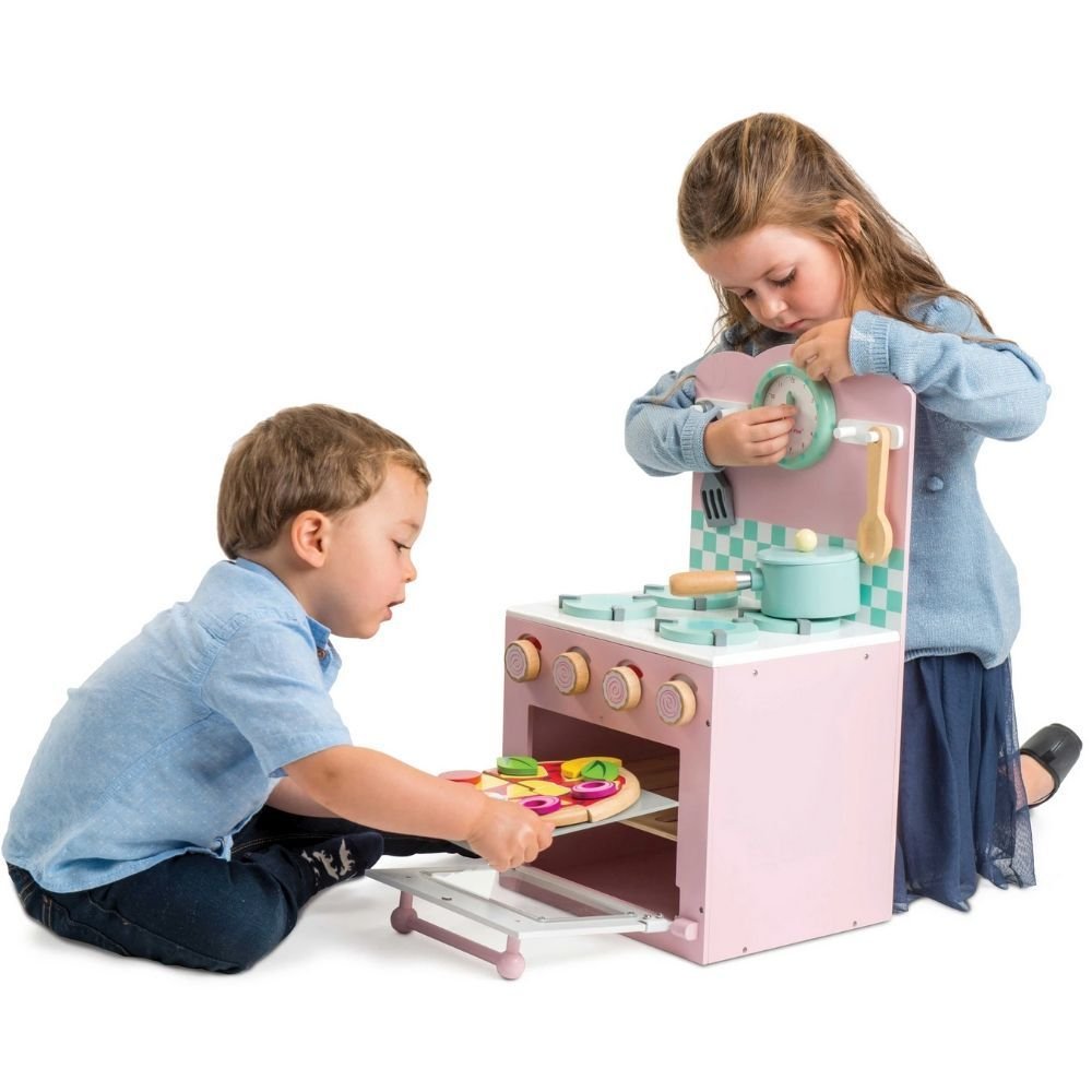 Le Toy Van Oven & Hob Pink, Le Toy Van Oven & Hob Pink,pretend play kitchen,imagintive play kitchen,childrens kitchen,sensory toys for schools,educational supplier,Children's kitchen set, Le Toy Van Oven & Hob Pink,The Le Toy Van Oven & Hob Pink is a stylish painted wooden oven & hob set. This Le Toy Van Oven & Hob Pink includes: a 4 ring hob with frying pan & play food, 2 utensils, a clock with movable hands, an easy open oven with removable rack and gingham oven gloves. The Le Toy Van Oven & Hob Pink is a