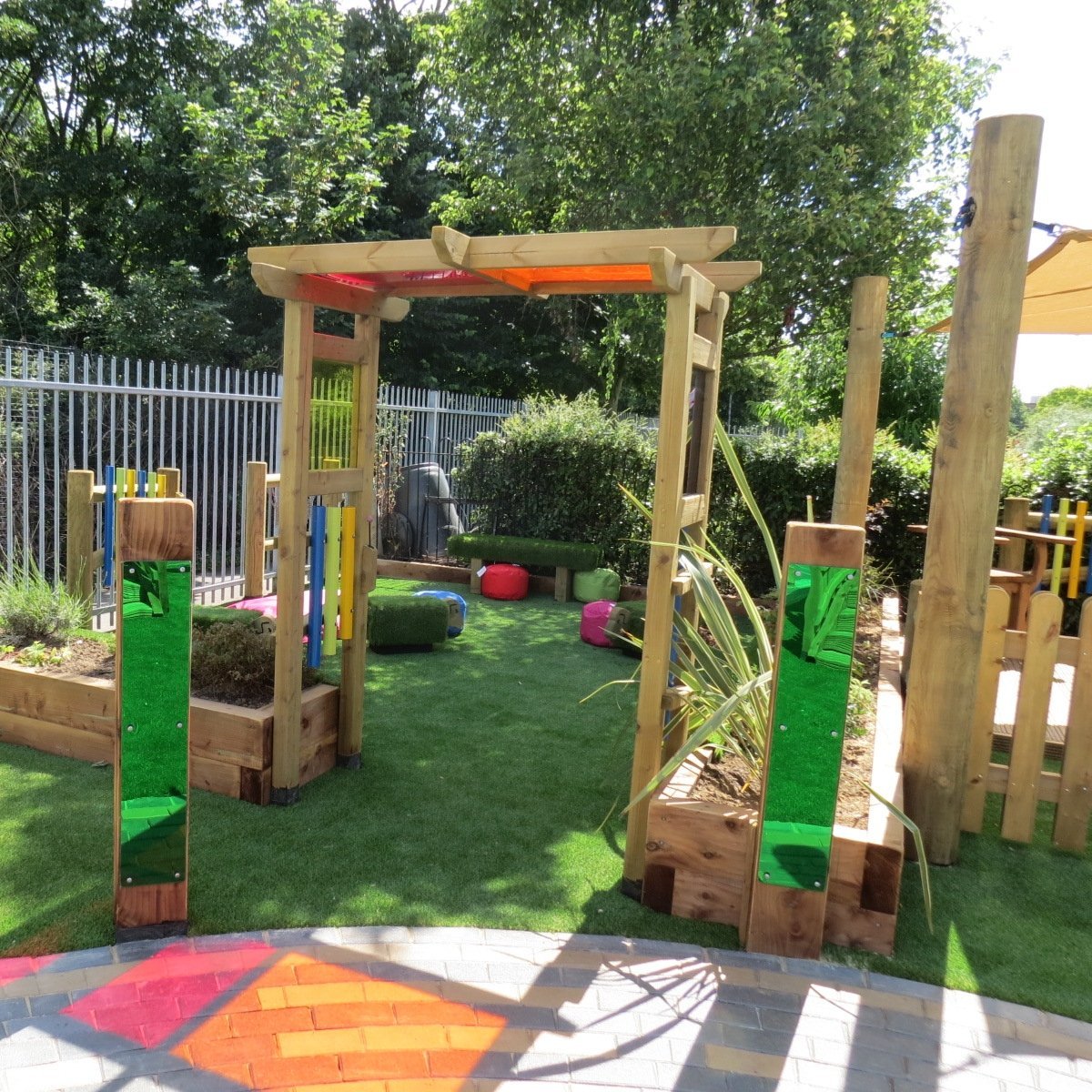 Light and Sound Arch, Light and Sound Arch,Children's Playground equipment, school playground equipment, school playground wooden houses, Light and Sound Arch,The Light and Sound Arch is a striking gateway to any sensory garden, now surely that is music to your ears? This wheelchair friendly timber Light and Sound Arch includes multi-coloured panels that cast an ever changing light show, combined with outdoor musical chimes to present a multi-use addition to any play or sens,LightThe Light and Sound Arch is