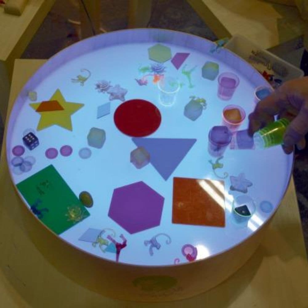 Magic Light Table, Magic Light Table,Sensory light panel,round light panel, school resources, resources for children, reception resources, Magic Light Table,Magic light table is a small and lightweight table designed for games, art and therapy. The table has a higher edge preventing sand, semolina and other small elements used for creation from spilling. The light consisting of even 16 different colours and four different automatic colour change programs help create an imp,Magic LightMagic light table is a 