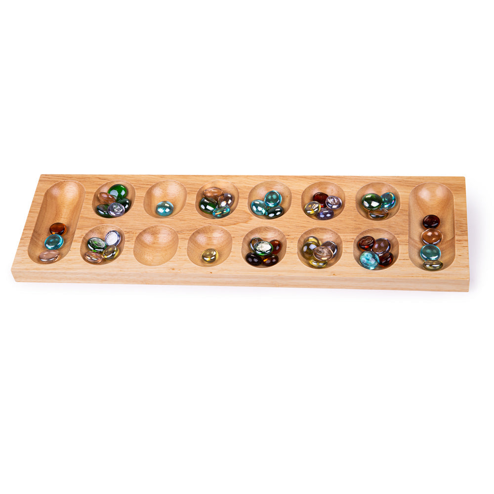 Mancala, Mancala,Mancala Game,Wooden Mancala Game,Counting Game,Counting Resources, Mancala,Bigjigs Mancala Game The Bigjigs Mancala is a classic two-player board game that combines strategy with skill. Simple yet engaging, the goal is to collect more marbles than your opponent by strategically dropping marbles into the various holes on the board. This traditional wooden game consists of two rows with six hol,MancalaBigjigs Mancala Game The Bigjigs Mancala is a classic two-player board game that combines st