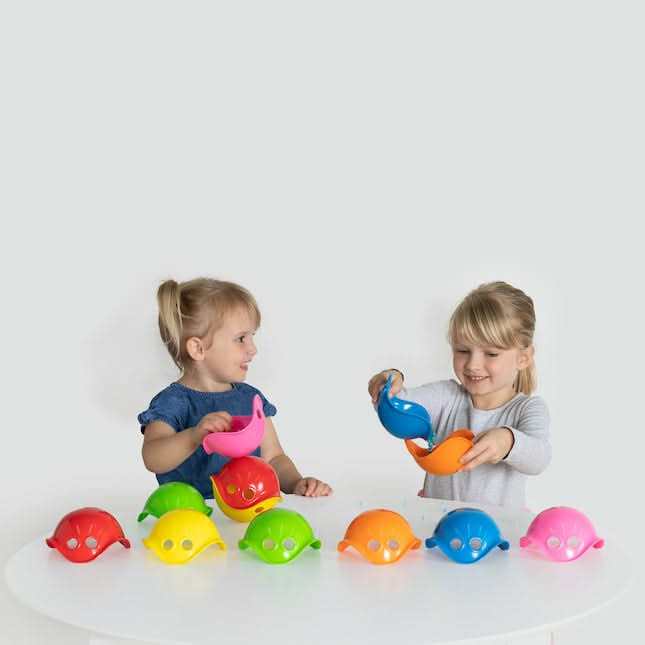 Moluk Bilibo Mini Set, Moluk Bilibo Mini Set,,mini Bilibo,Bilibo Mini,Bilibo,Bilibo Bilibo toy,Bilibo, Moluk Bilibo Mini Set – A World of Creative Play in Miniature Introducing the Moluk Bilibo Mini Set, a vibrant and compact take on the award-winning Bilibo toy, designed to ignite children's creativity and sensory exploration. This set of six mini Bilibo toys brings all the fun and versatility of the original in a perfectly sized format for little hands to grasp, stack, and experiment with. Whether at home