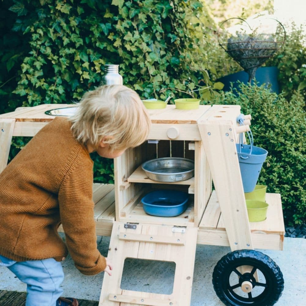 Mud Kitchen, Mud Kitchen,Mud Kitchen,Mud kitchen,sensory mud kitchen,mud kitchen school,nursery mud kitchen,playground equipment storage,playground storage equipment,outdoor wooden storage, Mud Kitchen,Thanks to the indestructible wheels, the Mud Kitchen can be pushed around as much as the children want! The Mud Kitchen has an oven two knobs that make clicking sounds, a large mud bowl, two small mud pots and two flower pots made of metal as well as recesses, hooks, and a storage surface for organising garde