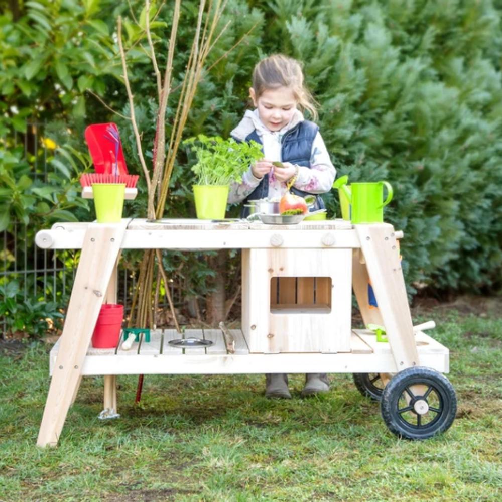 Mud Kitchen, Mud Kitchen,Mud Kitchen,Mud kitchen,sensory mud kitchen,mud kitchen school,nursery mud kitchen,playground equipment storage,playground storage equipment,outdoor wooden storage, Mud Kitchen,Thanks to the indestructible wheels, the Mud Kitchen can be pushed around as much as the children want! The Mud Kitchen has an oven two knobs that make clicking sounds, a large mud bowl, two small mud pots and two flower pots made of metal as well as recesses, hooks, and a storage surface for organising garde