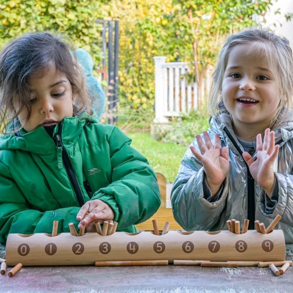 Natural Counting Log, Natural Counting Log,Natural counting resources, Natural play resources, wooden counting resource, wooden math resources, Natural Counting Log,This simple Natural Counting Log has equal-sized holes into which children can count out the appropriate number of sticks from a pile. When placed correctly in the sections, children can easily see the difference between the numbers (cardinality). Each side of the Natural Counting Log shows a slightly different range o,Natural Counting LogThis s