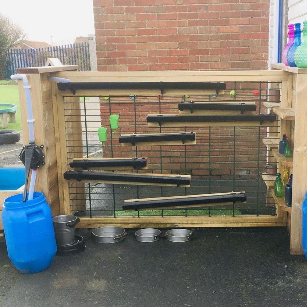 Outdoor Wooden Water Channelling Unit, Outdoor Wooden Water Channelling Unit,school Playground equipment,school playground equipment,school playground wooden houses, Outdoor Wooden Water Channelling Unit,The Outdoor Wooden Water Channelling Unit is an exciting, interactive channelling unit where the children can choose the layout and pump the water independently. Water is captured and collected into two large buckets. The channelling can be hooked into differentThe Outdoor Wooden Water Channelling Unit is a