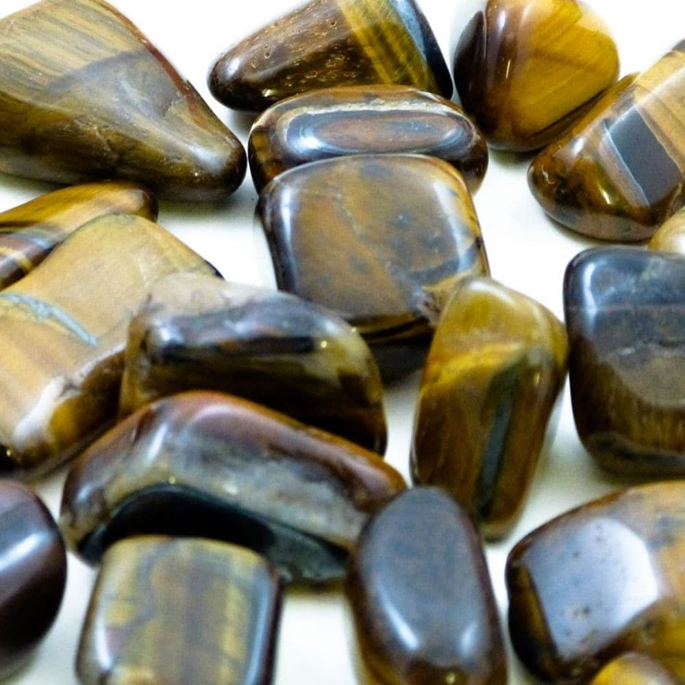 Polished Stones Tiger Eye 1kg, Polished Stones Tiger Eye 1kg,Polished stones natural play resources,Nature based play resources,Loose part play.heuristic play.natural play resources, Polished Stones Tiger Eye 1kg,These Polished Stones Tiger Eye are a unique and captivating addition to your sensory resources. Allow children to run their fingers over each smooth surface or roll them around in the light to appreciate the unique print. Each of these Polished Stones Tiger Eye can be used for exploration play or 