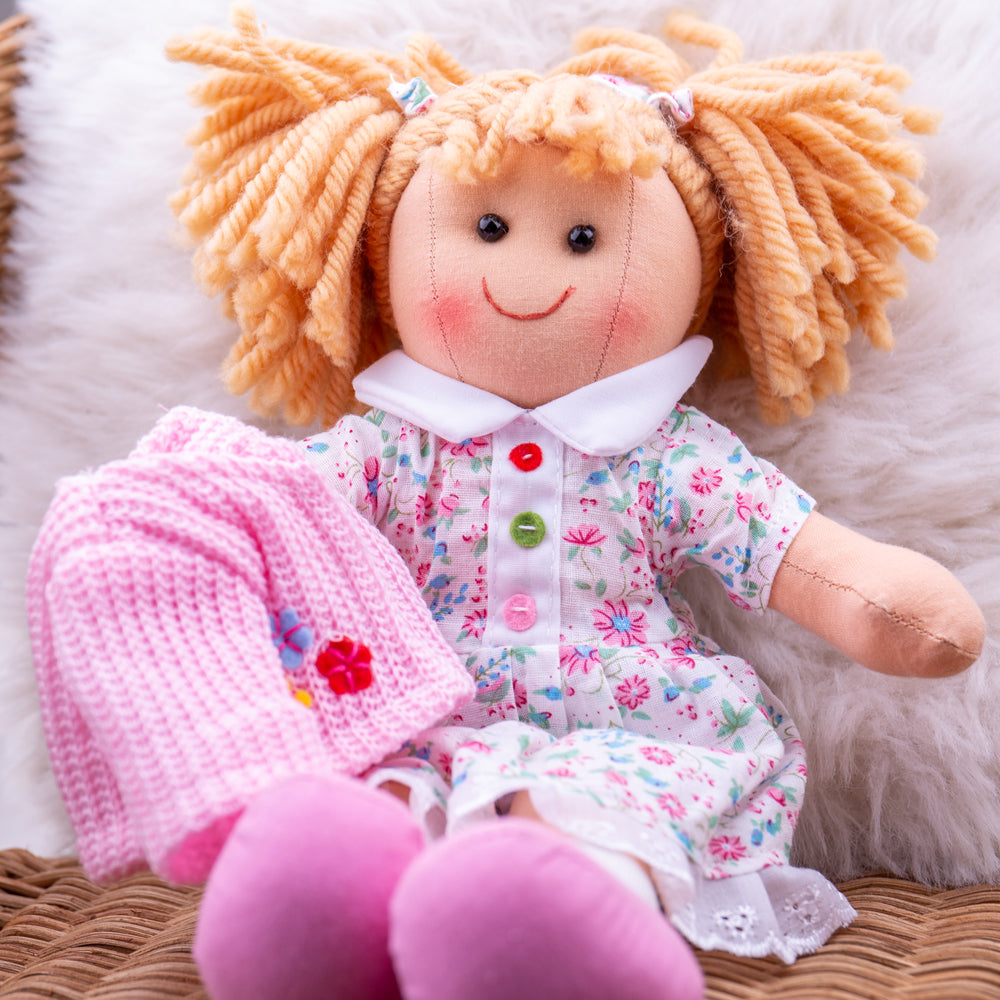 Poppy Doll - Small, , Poppy Doll - Small,Poppy Doll is ready to meet her new little best friend! Poppy is a soft and cuddly ragdoll dressed in an adorably cute outfit. This soft and cuddly doll is a fashion trendsetter with her bright dress and cute pink cardigan. She's kind and loving and likes nothing more than to share a secret and a hug. Poppy Doll’s soft,Poppy Doll - SmallPoppy Doll is ready to meet her new little best friend! Poppy is a soft and cuddly ragdoll dressed in an adorably cute outfit. This 