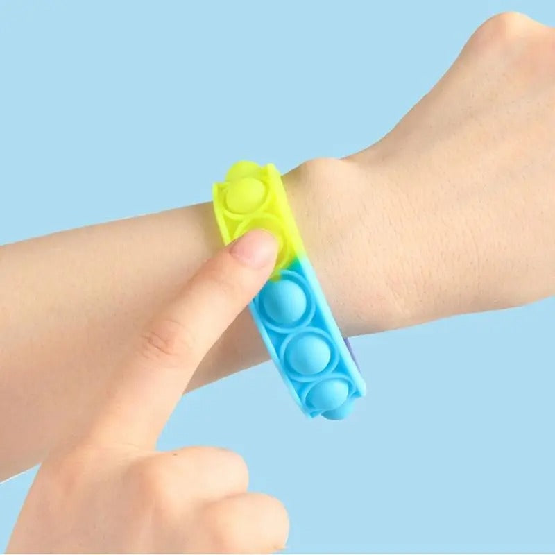 Rainbow Fidget Wristband, Rainbow Fidget Wristband,Fidget Bubble Popper,bubble popping toy,fidget toy bubble popping popper,fidget toys, Rainbow Fidget Wristband,Introducing the Rainbow Fidget Wristband, the ultimate sensory tool that will keep you entertained and relaxed for hours on end. If you've ever found joy in popping bubble wrap, then this is the perfect gadget for you. This wristband is designed to divert a busy mind, providing a therapeutic experience that helpsIntroducing the Rainbow Fidget Wrist