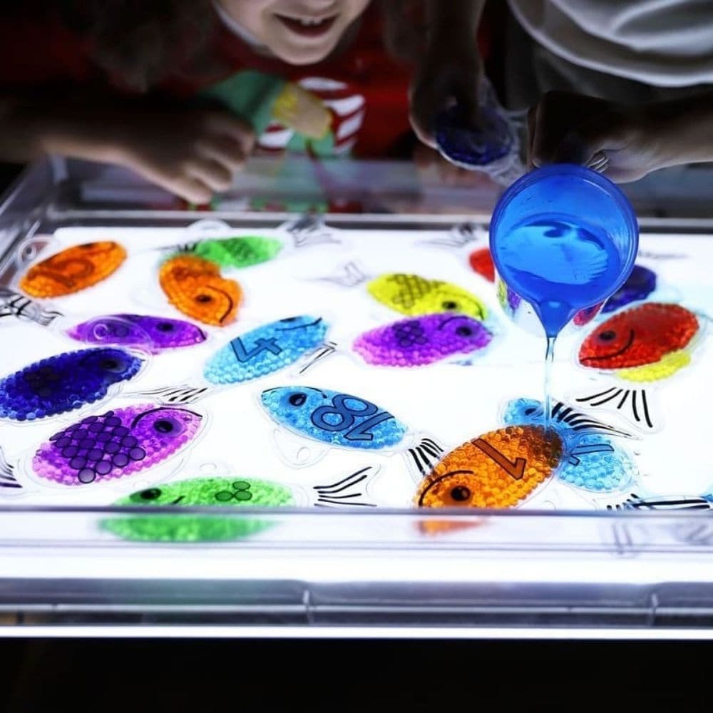 Rainbow Gel Number Fish, Rainbow Gel Number Fish,Tactile toys,light box resources,sensory light box resources,squidgy sensory toys,tactile toys, Rainbow Gel Number Fish,Vibrantly rainbow coloured Rainbow Gel Number Fish with numbers 0-20 on one side and their corresponding dots on the other. The Rainbow Gel Number Fish are Ideal for learning to count, to associate numbers with quantities, for colour recognition and for sensory play. The tactile squashy Rainbow Gel Number Fish containVibrantly rainbow colour