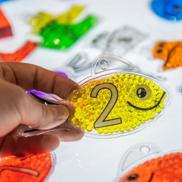 Rainbow Gel Number Fish, Rainbow Gel Number Fish,Tactile toys,light box resources,sensory light box resources,squidgy sensory toys,tactile toys, Rainbow Gel Number Fish,Vibrantly rainbow coloured Rainbow Gel Number Fish with numbers 0-20 on one side and their corresponding dots on the other. The Rainbow Gel Number Fish are Ideal for learning to count, to associate numbers with quantities, for colour recognition and for sensory play. The tactile squashy Rainbow Gel Number Fish containVibrantly rainbow colour