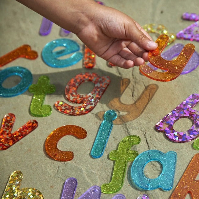 Rainbow Glitter Letters - Pk26, Rainbow Glitter Letters - Pk26,TickIT Rainbow Glitter Letters,Rainbow Glitter Letters,Rainbow Glitter Letters,sensorytoys4u discount code, Rainbow Glitter Letters - Pk26,The Rainbow Glitter Letters come as a set of 26 sparkling glitter lower case letters a-z in a child friendly font made from colourful translucent 3mm acrylic. The Rainbow Glitter Letters come in 7 colours, with the vowels in turquoise. Ideal for use on a light panel to make letter recognition interesting and 