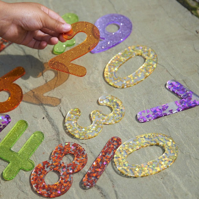 Rainbow Glitter Numbers - Pk14, Rainbow Glitter Numbers - Pk14,TickIT Rainbow Glitter Numbers,TickIT Toys, Rainbow Glitter Numbers - Pk14,The Rainbow Glitter Numbers are a set of 14 sparkling glitter numbers 0-9 made from colourful translucent 3mm acrylic. The Rainbow Glitter Numbers set includes two styles of the numbers 4 and 7, with an additional 1 & 0. They are ideal for use on a light panel to encourage numeral recognition. Numbers come with a 2.5mm,Rainbow Glitter NumbersThe Rainbow Glitter Numbers ar