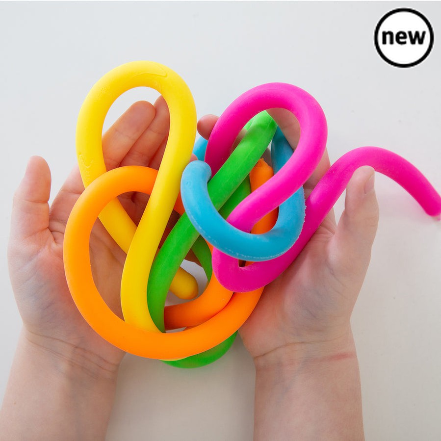 Schylling Noodlies, Schylling Noodlies,Noodlies.Stretchy String,Sensory Fidget Stretchy String,Fiddle toys,fidget toys,special needs tactile toys,special needs tactile toys,cheap tactile toys,autism tactile toys,special needs downs syndrome toys,special needs sensory toys, Schylling Noodlies,Noodlies fulfill the fun of playing with your food…without the mess! You can squeeze, stretch, knot, or mash these elastic noodles to your heart’s desire. Noodlies are brightly colored in 5 fluorescent tones and offer a