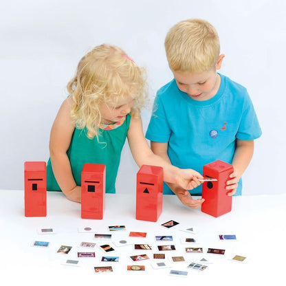 Shape Posting Game, Shape Posting Game,Shape recognition,Fine motor skills games,school numeracy resources,classroom numeracy resources, Shape Posting Game,The Shape Posting Game is a dynamic and educational activity designed to enhance children's shape recognition, sorting, and counting skills. Featuring four brightly coloured "post-boxes" and 40 double-sided picture cards, this engaging game encourages young learners to identifyThe Shape Posting Game is a dynamic and educational activity designed to enhan