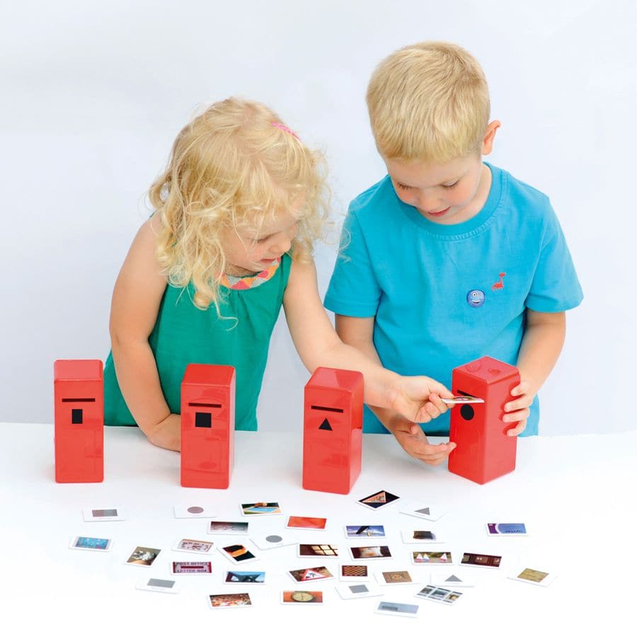 Shape Posting Game, Shape Posting Game,Shape recognition,Fine motor skills games,school numeracy resources,classroom numeracy resources, Shape Posting Game,The Shape Posting Game is a dynamic and educational activity designed to enhance children's shape recognition, sorting, and counting skills. Featuring four brightly coloured "post-boxes" and 40 double-sided picture cards, this engaging game encourages young learners to identify and match shapes in a fun, hands-on way. ,Shape Posting GameThe Shape Posting