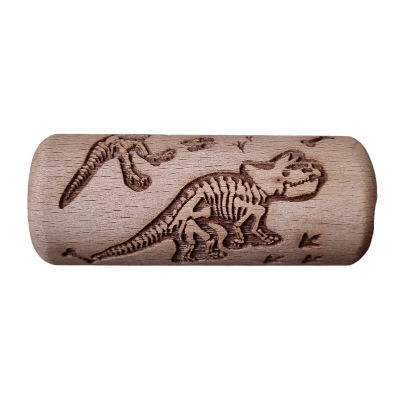 Small Dino Wooden Roller, Small Dino Wooden Roller,Dino Wooden Roller,Wooden Roller,Wooden Dough Rollers,Dough rolling pin,messy play rolling pin, Small Dino Wooden Roller,Made of high-quality wood, this Small Dino Wooden Roller is sturdy and durable, ensuring endless hours of creative play for children of all ages. The embossed design creates texture that adds a unique touch to clay and playdough creations, making it a must-have tool for young artists and crafters.The Small Dino Wooden ,Small Dino Wooden R