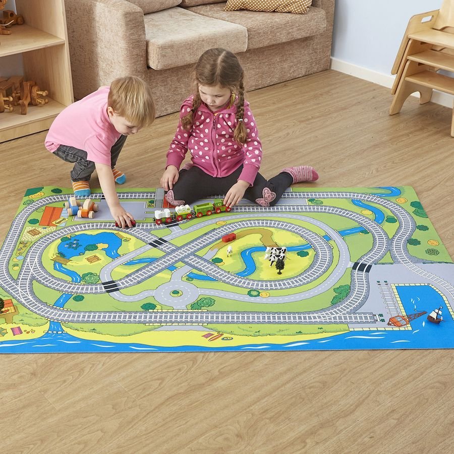 Small World Railway Themed Play Mat, Small World Railway Themed Play Mat,classroom equipment,classroom supplies,classroom furniture,classroom carpets,classroom rugs,story time corner rug, Small World Railway Themed Play Mat,Create an enchanting world of imaginative play with the Small World Railway Themed Play Mat, the perfect accessory to spark creativity and storytelling in children. This delightful play mat invites young minds to design their own railway adventures, offering a vibrant figure-of-8 track a