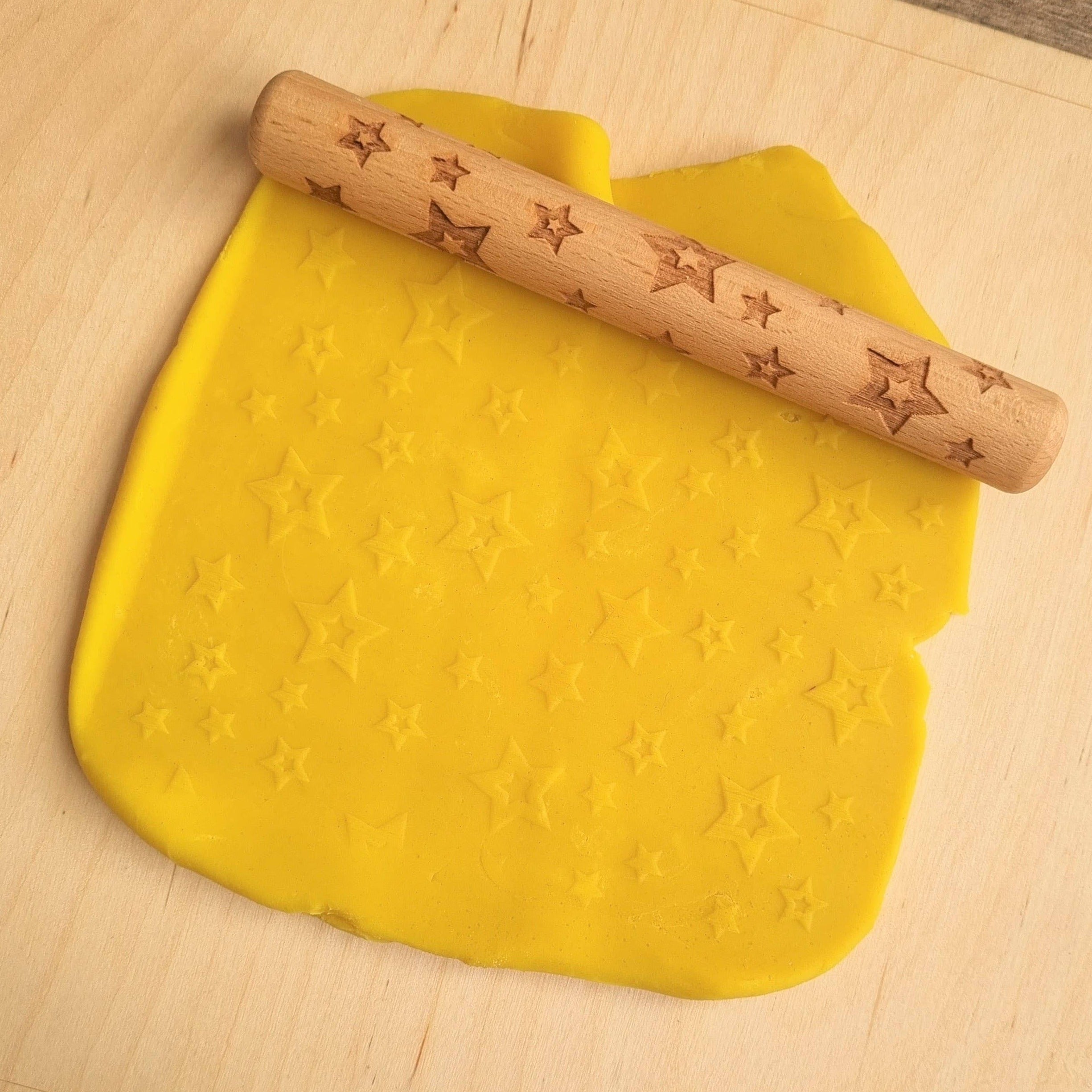 Stars Wooden Roller, Stars Wooden Roller,Wooden Roller,Wooden Roller,Wooden Roller,Wooden Dough Rollers,Dough rolling pin,messy play rolling pin, Stars Wooden Roller,Introducing our Stars Wooden Roller.This unique and charming roller is the perfect addition to your child's art and sensory playtime. Made from high-quality wood, this Stars Wooden Roller is designed to create texture and relief as your little ones roll out their clay creations. The Stars Wooden Roller features a fun s,Stars Wooden RollerIntrod