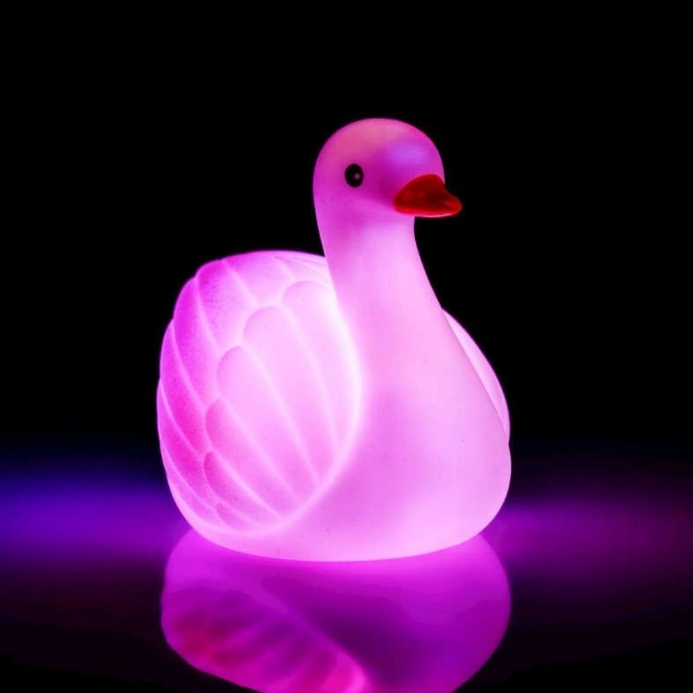 Swan Bath Light, Swan Bath Light,Light up bath toys,bath light gift,novelty bath lights,novelty bath toys,spa lights,bath lighting,bath light,bath lights, Swan Bath Light,Transform bath time into a magical experience with our enchanting Light Up Swan Bath Toy. This delightful companion adds a splash of wonder to your little one’s routine, turning the tub into a radiant aquatic playground. As soon as it touches the water, this elegant swan springs to life, bobbing gracefully while castin,Swan BathTransform b