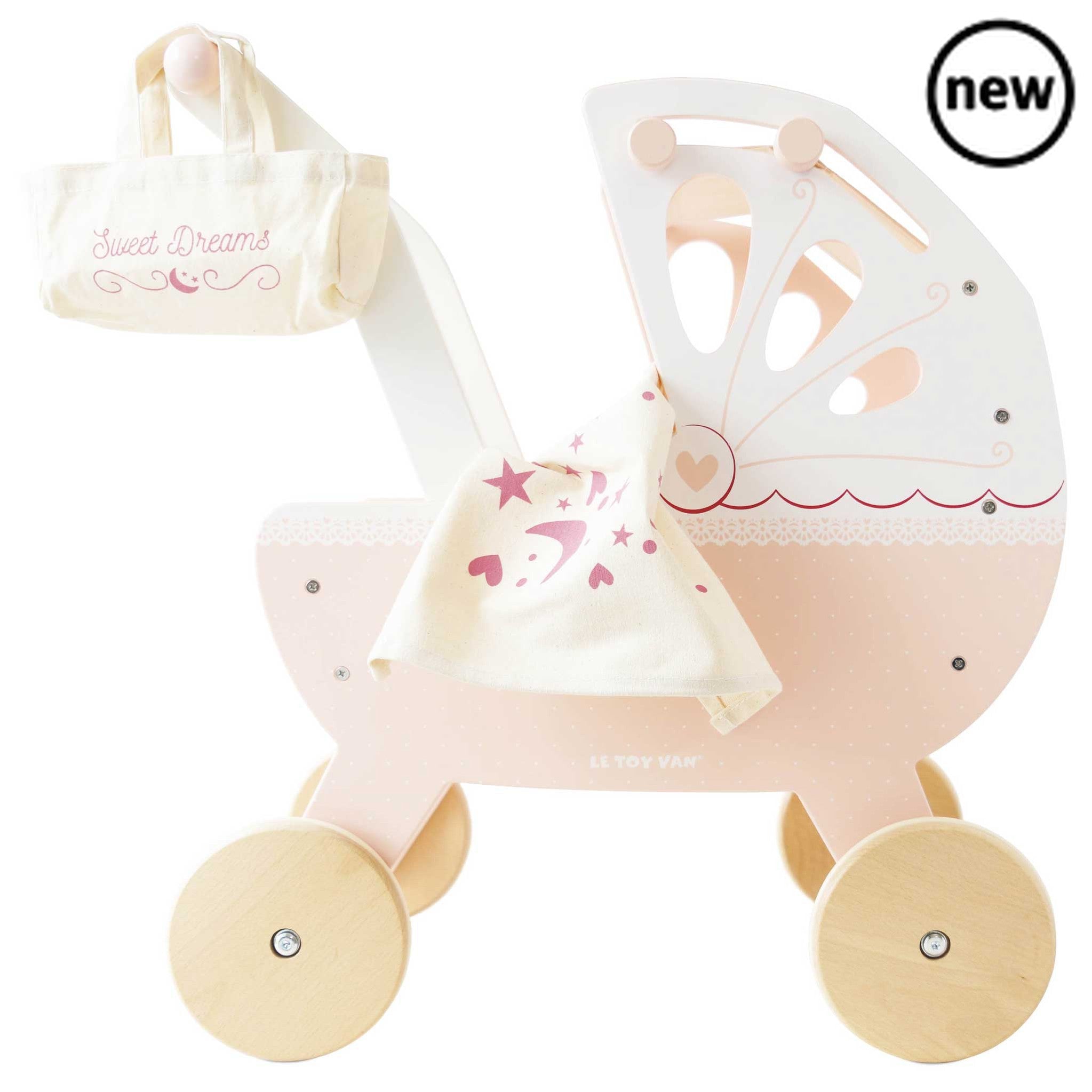 Sweet Dreams Doll Pram, , Sweet Dreams Doll Pram,Take dolly out and about on all their childhood adventures with our beautiful, traditional wooden doll pram stroller. Lovingly designed, this little beauty is full of nostalgia, adorned with prettiest, delicate detailing with heart and lace motifs. Featuring a soft pastel pink, cream and fresh white colour palette, it',Sweet Dreams Doll PramTake dolly out and about on all their childhood adventures with our beautiful, traditional wooden doll pram stroller. Lo